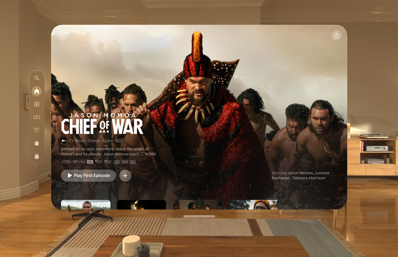 The Apple TV experience of Apple Vision Pro is displayed in a lounge room, with a still image from the Apple TV series Chief of War