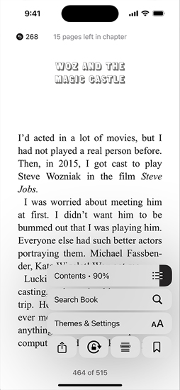 iPhone screen displaying a book page in the Books app. Overlaid on the book page, options for enlarging text, Search Book, and Themes & Settings on the screen are shown
