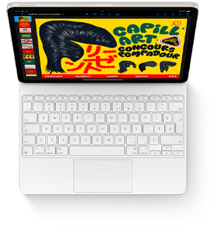 Vue en plongée d’un iPad Air avec un Magic Keyboard blanc pour iPad Air.