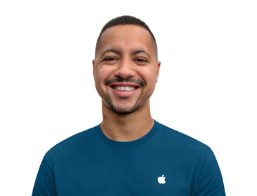 Apple Specialist smiling with an approachable demeanor