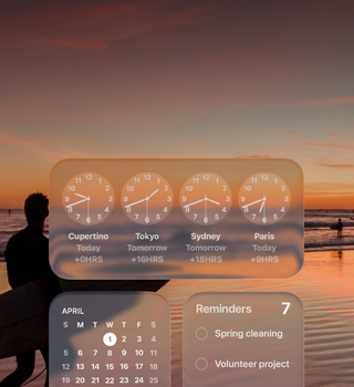 Liquid Glass Clock, Calendar, Reminders, and Weather widgets on macOS Tahoe screen over a scene of a surfer walking on the beach at sunset