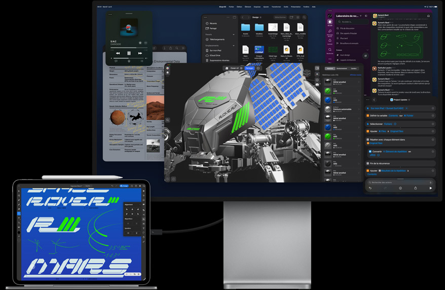 iPad Pro fixé à un Magic Keyboard, face avant, tous deux connectés à un Mac Studio Display externe, écran de l’iPad Pro affichant une app de design graphique avec texte et couleurs éclatantes, Studio Display montrant diverses apps et un modèle 3D