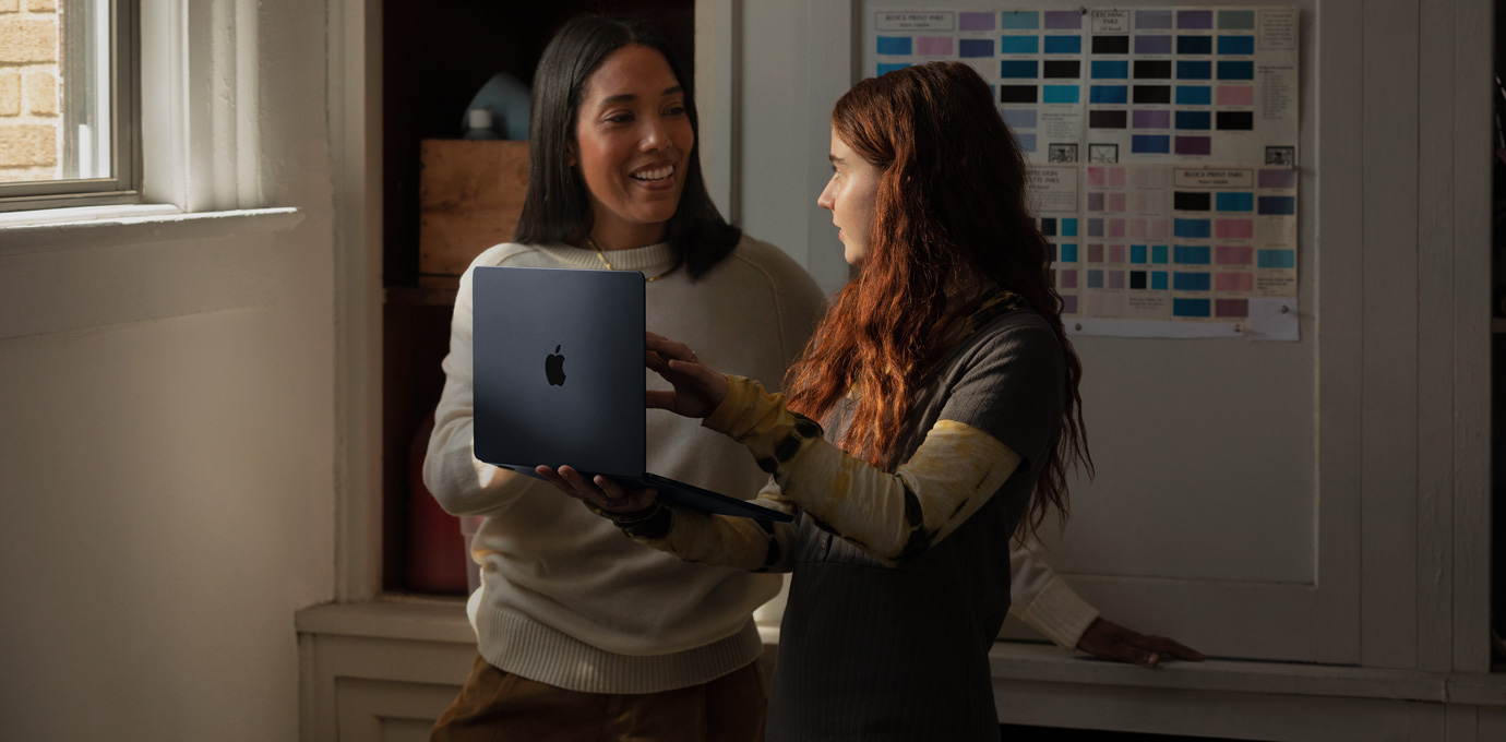 People using Mac in an education setting