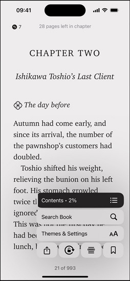 iPhone screen displaying a book page in the Books app. Overlaid on the book page, options for enlarging text, Search Book and Themes & Settings on the screen are shown.