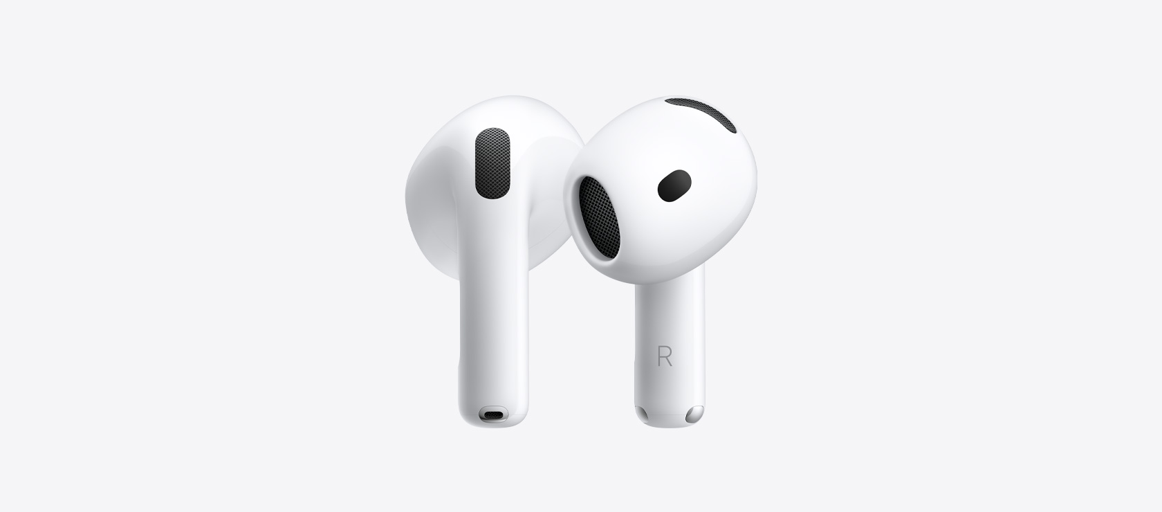 AirPods 5: auricolari wireless bianchi, forma ovale, punta dell’auricolare con maglia dell’altoparlante interno, stelo corto con connettore di ricarica color argento, su ciascun auricolare è presente una lettera per distinguere quello destro da quello sinistro