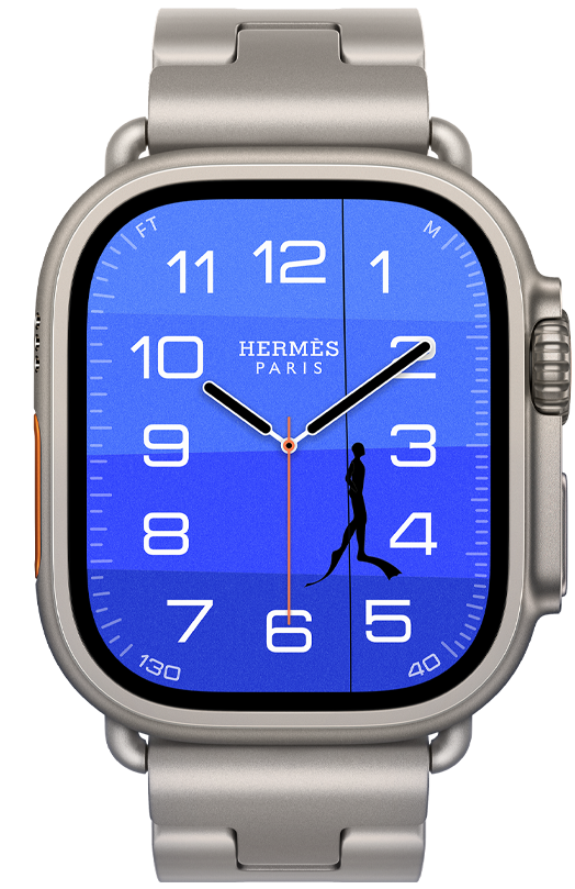 Apple Watch Hermès Ultra 4, Fathom and Wonder analog watch face (hour, minute, and second hands, Depth complication, with an orange buoy floating on top of a turquoise ocean with a gradient from light to dark blue), titanium case, natural color, right side exterior, Digital Crown, raised side button, paired with Grand H Titane band, Gris Titane color