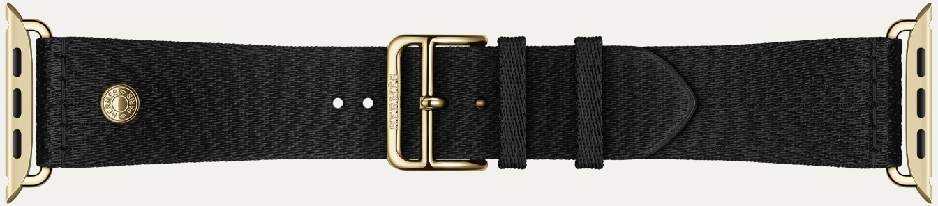 รายละเอียดของสายแบบ Clou de Selle Satin สี Noir สำหรับ Apple Watch Hermès Series 12, สายเว็บบิ้งแบบซาตินสีดำเรียบเนียน พร้อมฮาร์ดแวร์สีเรเดียนท์โกลด์