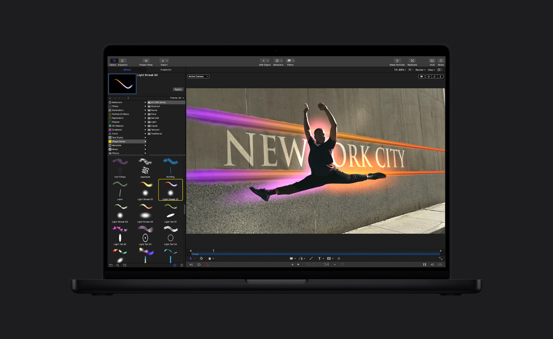 MacBook Pro 16, male dancer mid-leap with halo around him, demo of paint tool