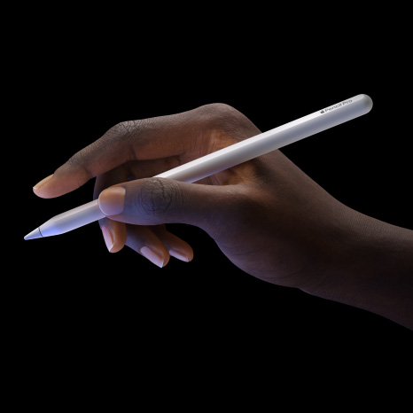 User holds Apple Pencil Pro showcasing double tap feature