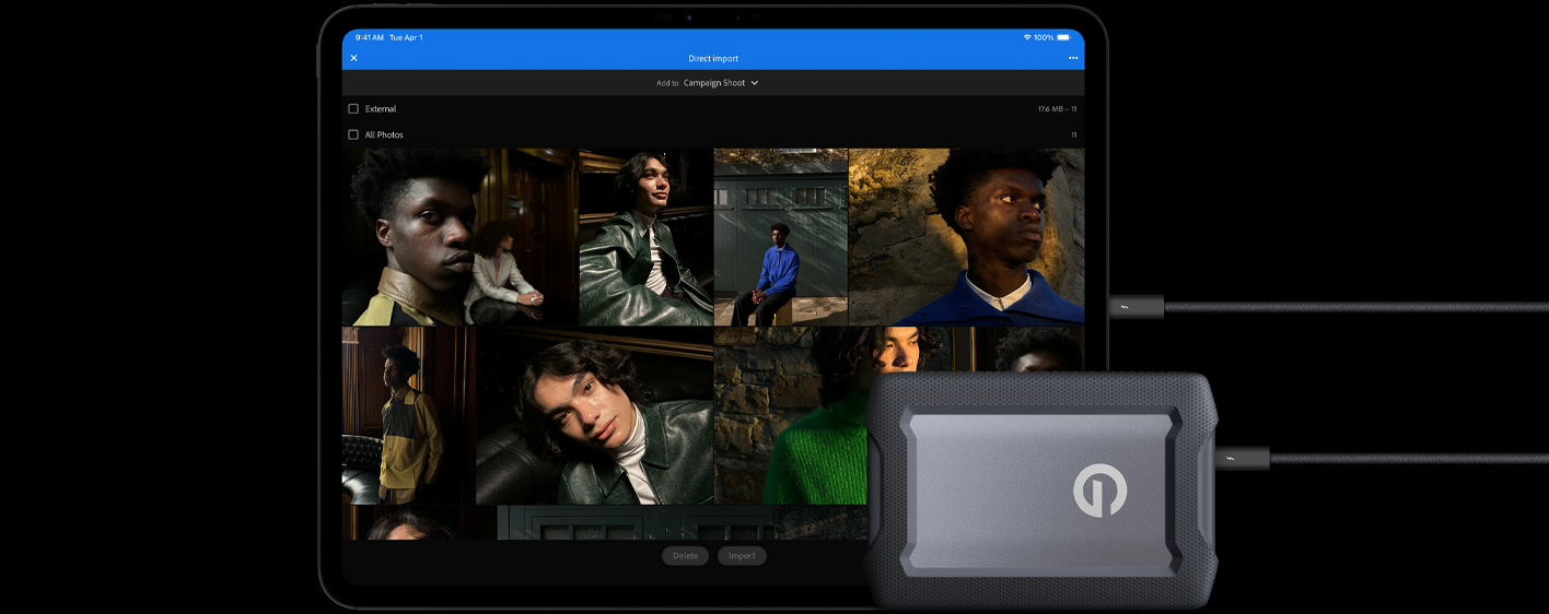 „iPad Pro“, priekinė pusė, horizontalioje padėtyje, kosminės juodos spalvos, prijungtas kabeliu prie USB‑C išorinio kietojo disko, ekrane rodomos modelių nuotraukos, importuojamos į aplanką „Kampanijos fotosesija“