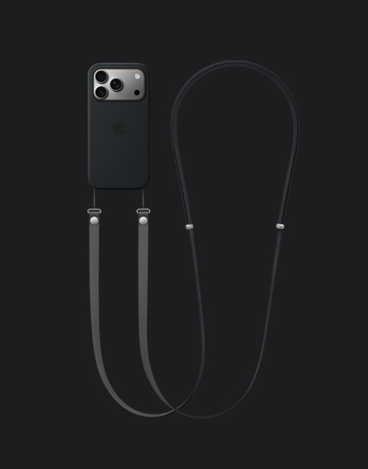 iPhone 17 Pro, back exterior, silver finish, with black Silicone Case with MagSafe and dark gray Crossbody Strap attached