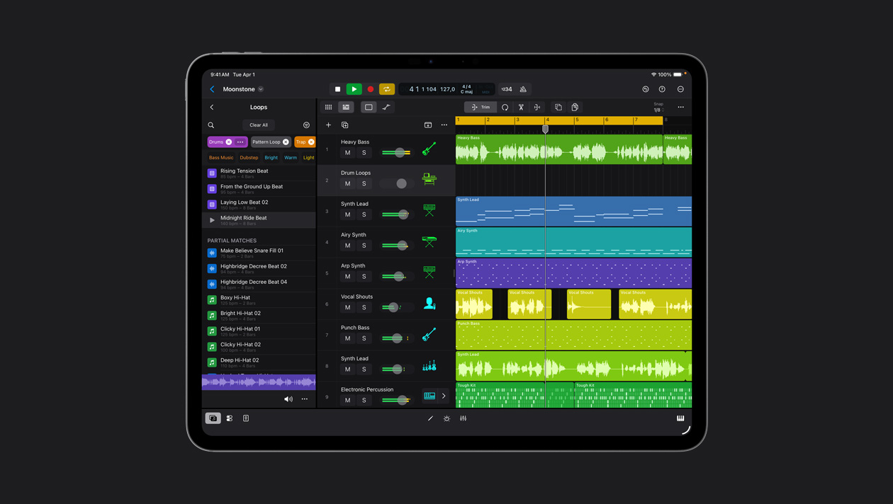 iPad Pro 13 screen showing Logic Pro workspace, Loops panel to the left, rows of soundwaves in different colors